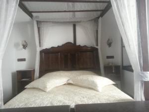 Postel nebo postele na pokoji v ubytování Villa Perla Hotel + 37 fotografií