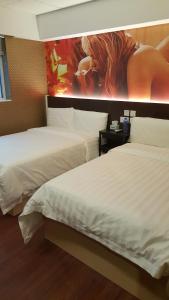 Whole Sunshine International Guest House 객실 침대