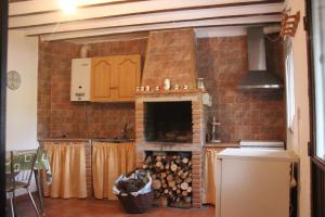 Kuchyň nebo kuchyňský kout v ubytování Alojamiento Rural Puente Honda