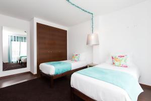 Ένα ή περισσότερα κρεβάτια σε δωμάτιο στο D Wan Deluxe Apartments +143 φωτογραφίες