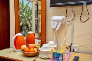 A television and/or entertainment centre at Hotel Grand Holiday