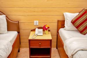 A seating area at Hotel Grand Holiday