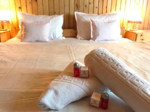 En eller flere senge i et værelse på Green Villa