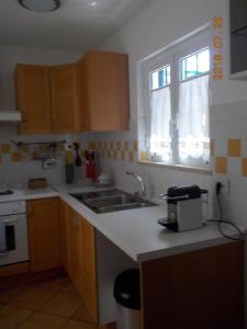 A kitchen or kitchenette at L'attico di Val. Még 5 kép