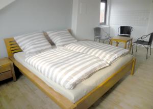 Ein Bett oder Betten in einem Zimmer der Unterkunft Bremer Bio Bleibe