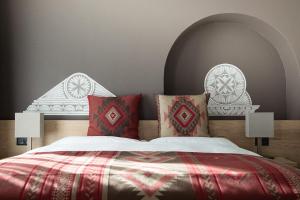 מיטה או מיטות בחדר ב-Hotel Steffani