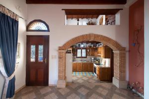 A kitchen or kitchenette at Secret Paradise Beach Villa