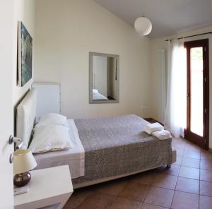 Tempat tidur dalam kamar di Casa Renili