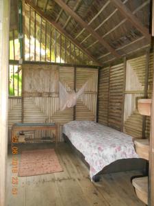 מיטה או מיטות בחדר ב-Posada Villamaga