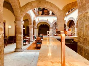Posezení v ubytování Hotel Herencia By Hosting House