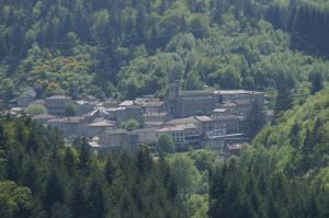 a town in the middle of a mountain at Gîte-La Combelle in Dornas