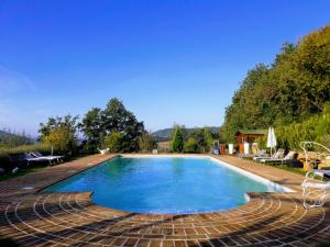 Bazén v ubytování Le Ginestre Apartments Assisi nebo v jeho okolí