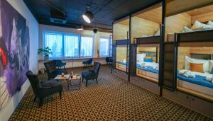 Posteľ alebo postele v izbe v ubytovaní CHORS like a hotel - Capsule & NFT Boutique Hostel Bratislava - City Center