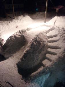 a statue of a fork in the snow at Vinara Kupres in Kupres