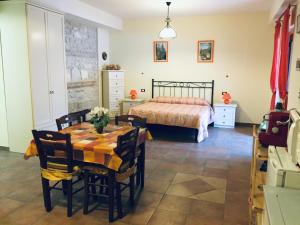 Postel nebo postele na pokoji v ubytování Il Poggio Dei Pettirossi