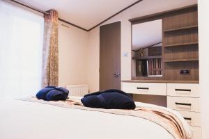 Posteľ alebo postele v izbe v ubytovaní Atlas Ovation Lodge