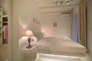 Postel nebo postele na pokoji v ubytování Villa Kimothoe by Thalassa Residence Mykonos