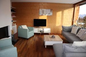 TV a/nebo společenská místnost v ubytování Casa Fluras