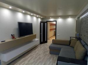 TV a/nebo společenská místnost v ubytování Сity Central ap.