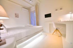 Postel nebo postele na pokoji v ubytování Villa Kimothoe by Thalassa Residence Mykonos