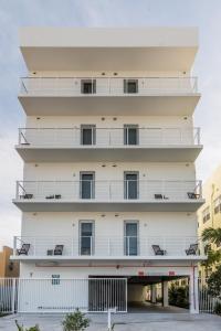a building with balconies on the side of it at VHC Modern Apartments in Miami Beach