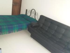 מיטה או מיטות בחדר ב-Cómoda y bonita habitación Independiente