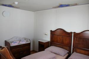 Katil atau katil-katil dalam bilik di Albergo San Gottardo