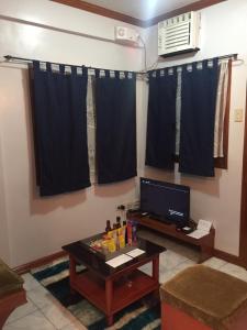 Nápoje v ubytování Las Pinas Serviced Apartment