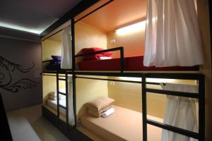 Dong Paloh Hostel客房内的一张或多张床位