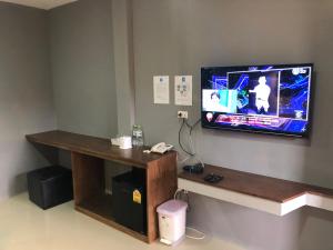 TV a/nebo společenská místnost v ubytování The C Hotel