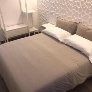 Llit o llits en una habitació de ViVi House