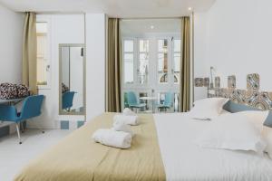 Postel nebo postele na pokoji v ubytování Hostal Gravina