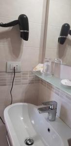 Koupelna v ubytování Hotel Margherita Meublè