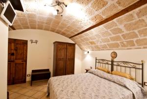 Postel nebo postele na pokoji v ubytování B&B Casa Cimino - Monopoli - Puglia