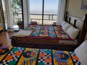Postel nebo postele na pokoji v ubytování Top Twelve Hotel - Lalibela