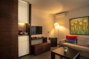 Kuchyň nebo kuchyňský kout v ubytování Eleven Hotel