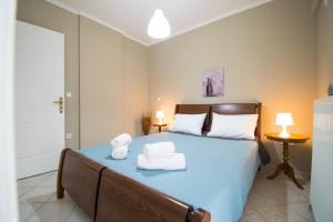 Posteľ alebo postele v izbe v ubytovaní BETTY'S AIR+PORT SEA APARTMENT