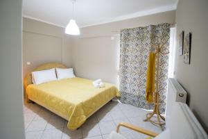 Posteľ alebo postele v izbe v ubytovaní BETTY'S AIR+PORT SEA APARTMENT