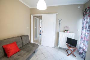 Televízia a/alebo spoločenská miestnosť v ubytovaní BETTY'S AIR+PORT SEA APARTMENT