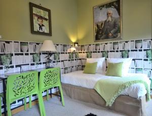 Letto o letti in una camera di Hôtel Vauban