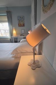 Letto o letti in una camera di Hôtel Vauban
