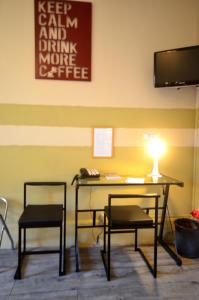 TV o dispositivi per l'intrattenimento presso Hôtel Vauban