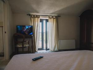 Säng eller sängar i ett rum på Masseria Sacramento