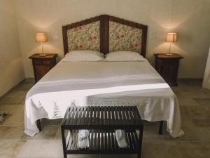 Säng eller sängar i ett rum på Masseria Sacramento