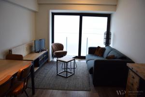 Μια τηλεόραση ή/και κέντρο ψυχαγωγίας στο Residentie Caraibes, 9de verdieping