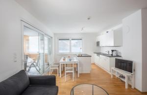Kuchyňa alebo kuchynka v ubytovaní Appartements Ramsau am Dachstein by Schladmingurlaub + 37 fotografií