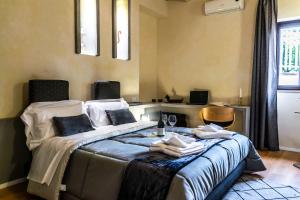Postel nebo postele na pokoji v ubytování Diodorus Luxury Experience