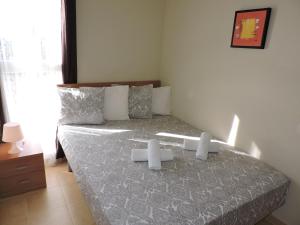 A bed or beds in a room at La Manga Apartments - Punta Cormoran Még 13 kép