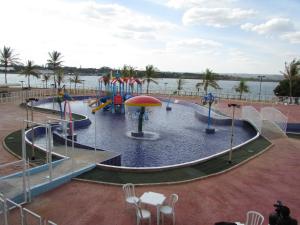 a water park with two slides and a water park at Bay Park Hotel Resort in Brasilia