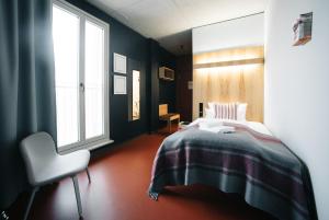 Postel nebo postele na pokoji v ubytování Hotel Rossi
